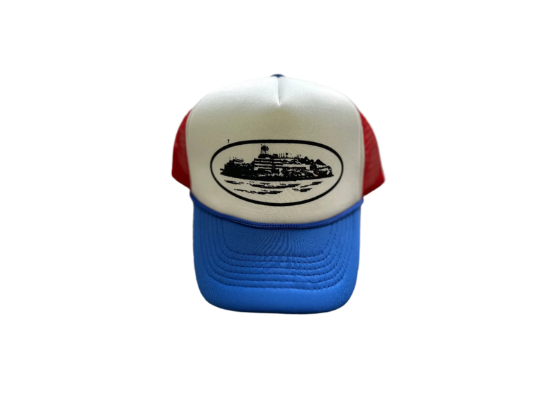Corteiz Alcatraz trucker hat in red, white, and blue design.
