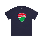 Corteiz Shield Tee in navy featuring a bold shield design on the front.