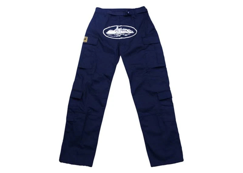 Corteiz Guerillaz Cargos in navy and white with multiple pockets.