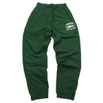 Corteiz Shukushuku green track pants with logo on the side.
