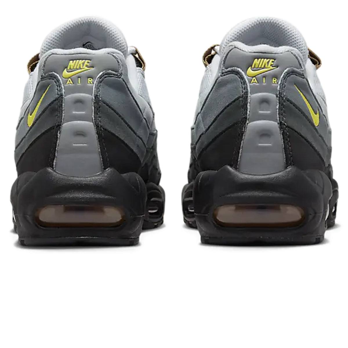 Rear view of Nike Air Max 95 Icons sneakers in gray and black with yellow accents.