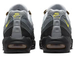 Rear view of Nike Air Max 95 Icons sneakers in gray and black with yellow accents.