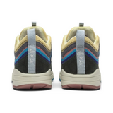 Back view of Sean Wotherspoon x Air Max 1/97 sneakers showcasing colorful corduroy and suede design.