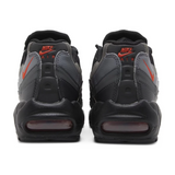 Nike Air Max 95 Black Picante Reflective sneakers, rear view showing reflective details and Picante Red accents.