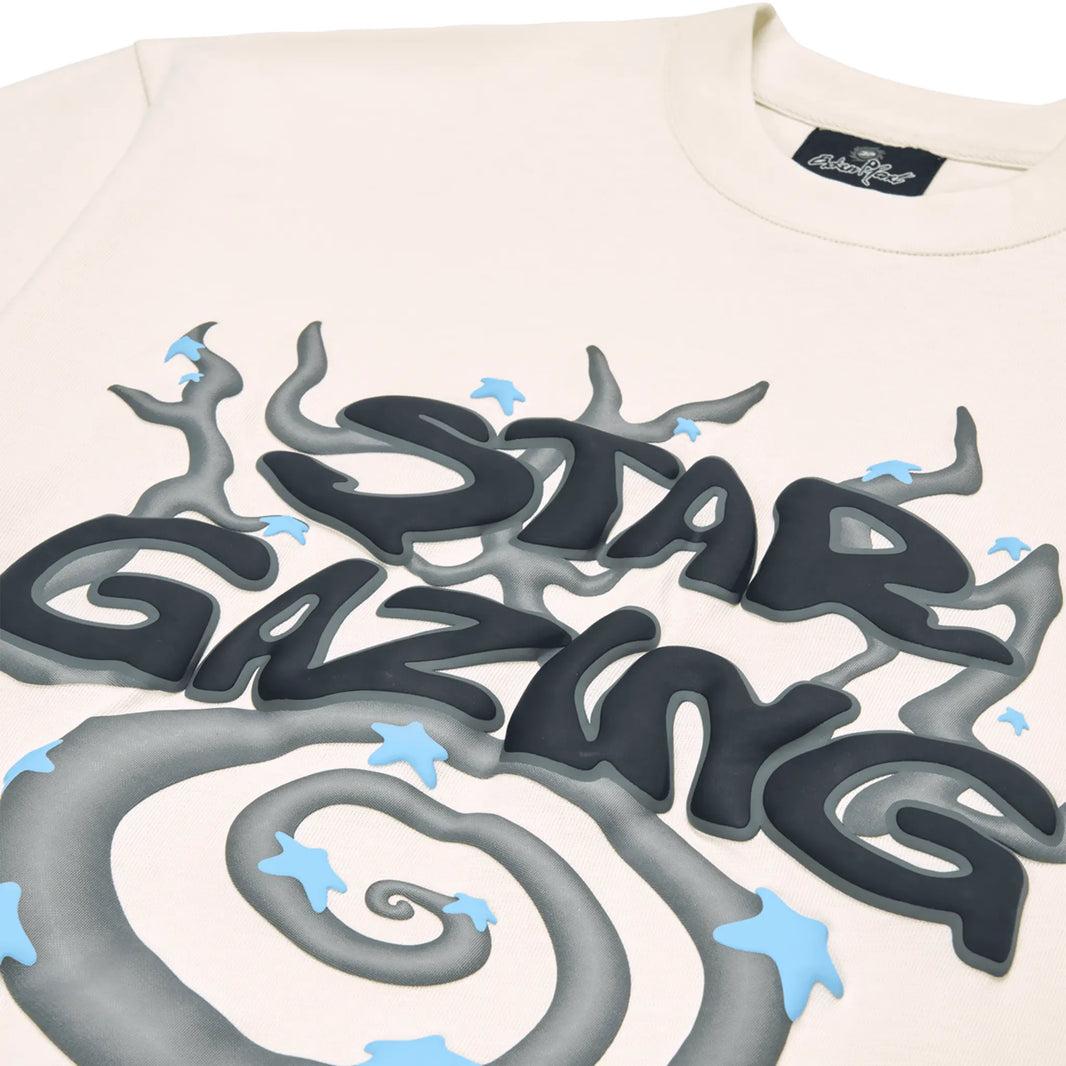 Broken Planet Star Gazing Vanilla White T-shirt with star gazing graphic in black and blue.