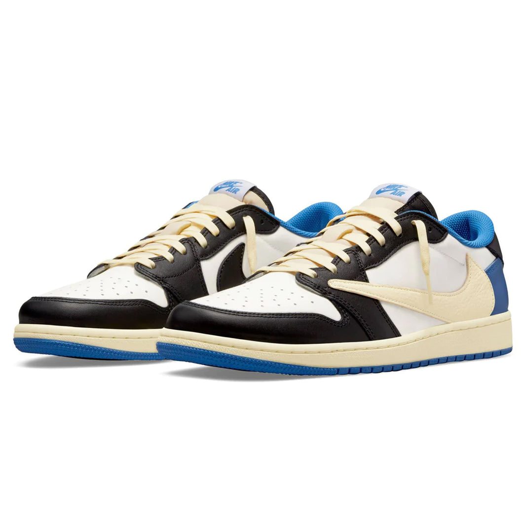Air Jordan 1 Retro Low x Travis Scott Fragment sneaker with white leather, black suede overlays, and blue accents.