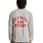 Jeanius Bar Atelier varsity long sleeve t-shirt in cream and red with vintage wash and boxy fit