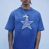 man wearing Last Lesson Blue Washed Star T-shirt in wash blue with star graphic