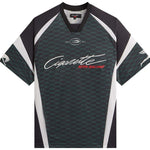 Kith x Cigarette Racing mesh jersey with black and white panels and logo print on front and sleeves