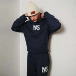 Natural Art Studio navy applique cotton sweatshirt with raglan seams and metal rivets on pockets