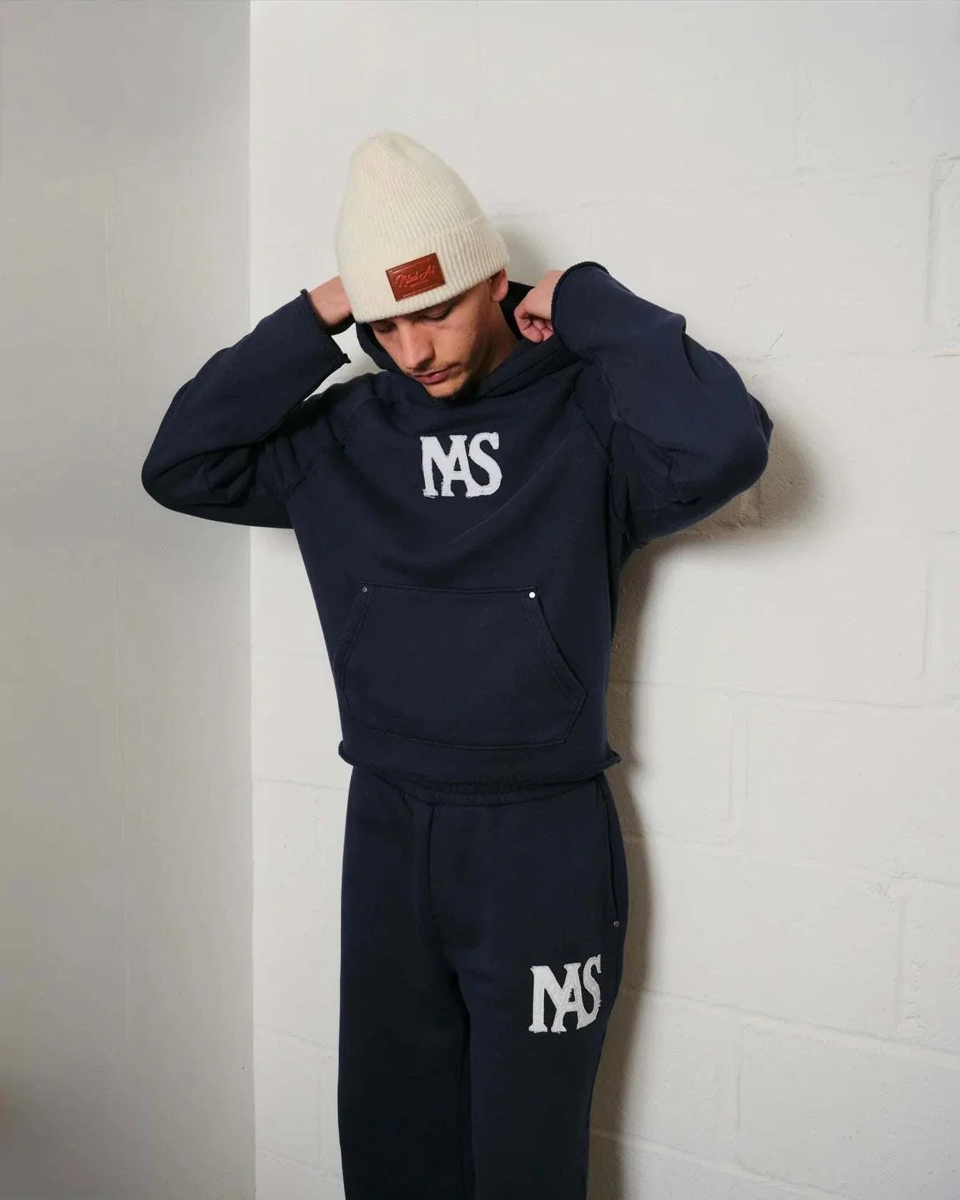 Natural Art Studio navy applique cotton sweatshirt with raglan seams and metal rivets on pockets