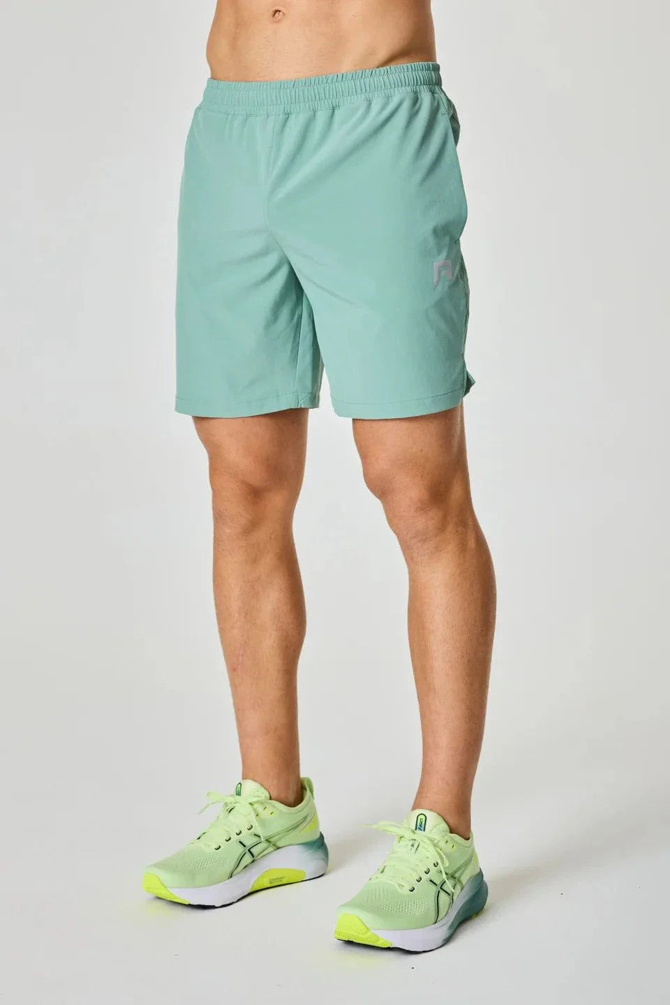 Reprimo Pulse Shorts in Seafoam color worn by a person.