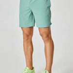 Reprimo Pulse Shorts in Seafoam color worn by a person.