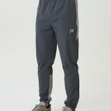 Reprimo Vortex Pants in faded dune and slate with ergonomic panels and adjustable waistband for flexible performance