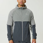 Reprimo Vortex Windbreaker in Faded Dune and Slate with ergonomic panels and reflective details