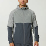 Reprimo Vortex Windbreaker in Faded Dune and Slate with ergonomic panels and reflective details