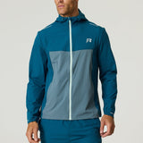 Men's Reprimo Flight Windbreaker in tidal teal and blue steel with zip pockets and hood, lightweight wind and rain resistant jacket.