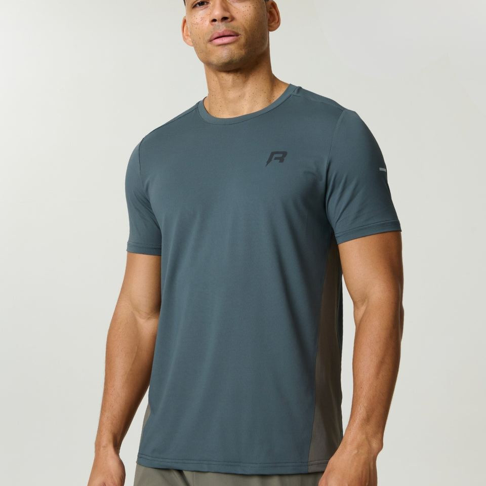 Reprimo Vortex T-Shirt in Dark Moss and Grey Velvet with ergonomic panels and lightweight fabric for athletic performance