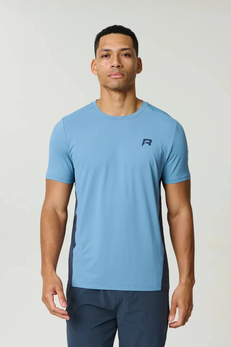 Reprimo Vortex T-Shirt in dusty blue with ergonomic panels and lightweight performance fabric