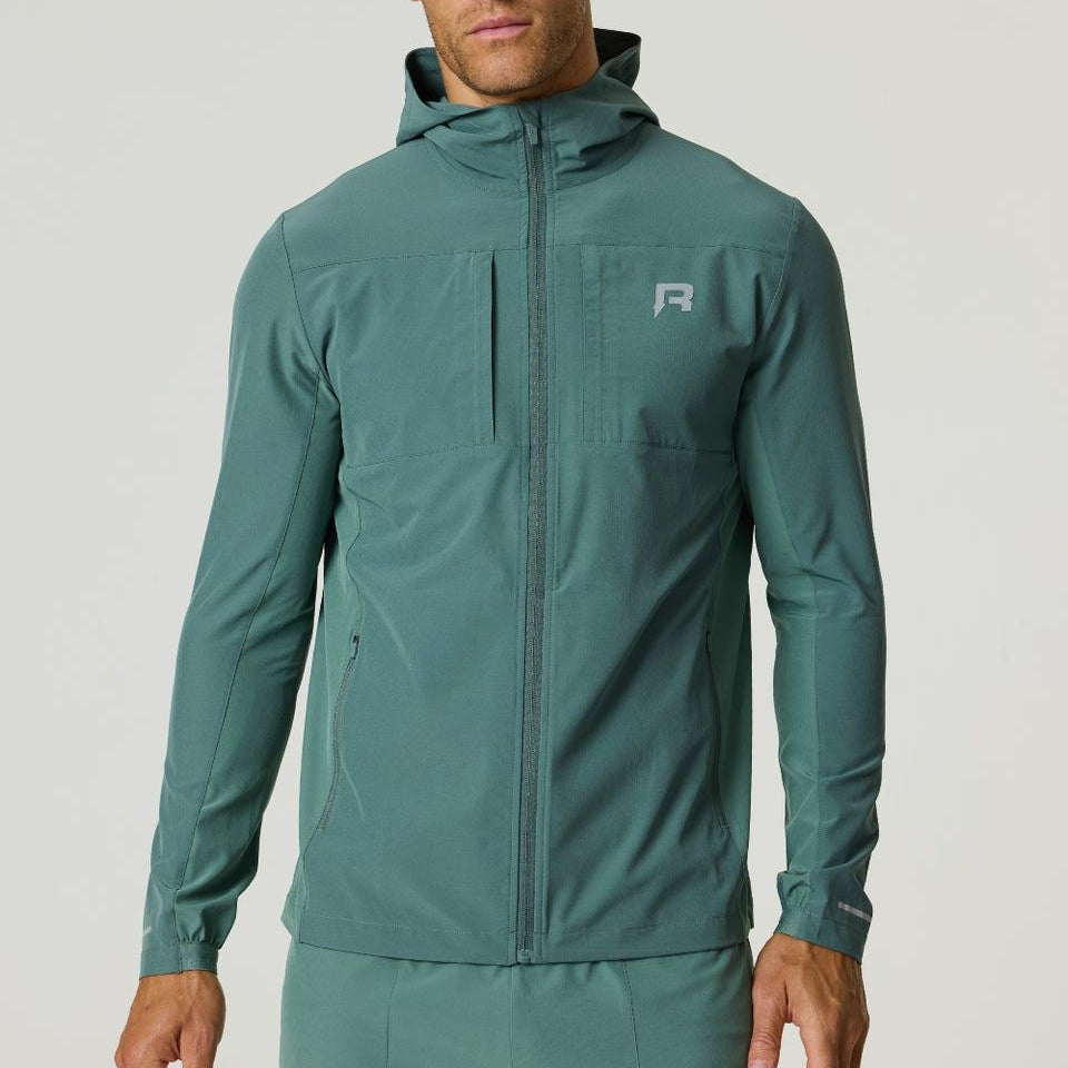 Men wearing botanical green Reprimo Glide Jacket with front zipper and hood