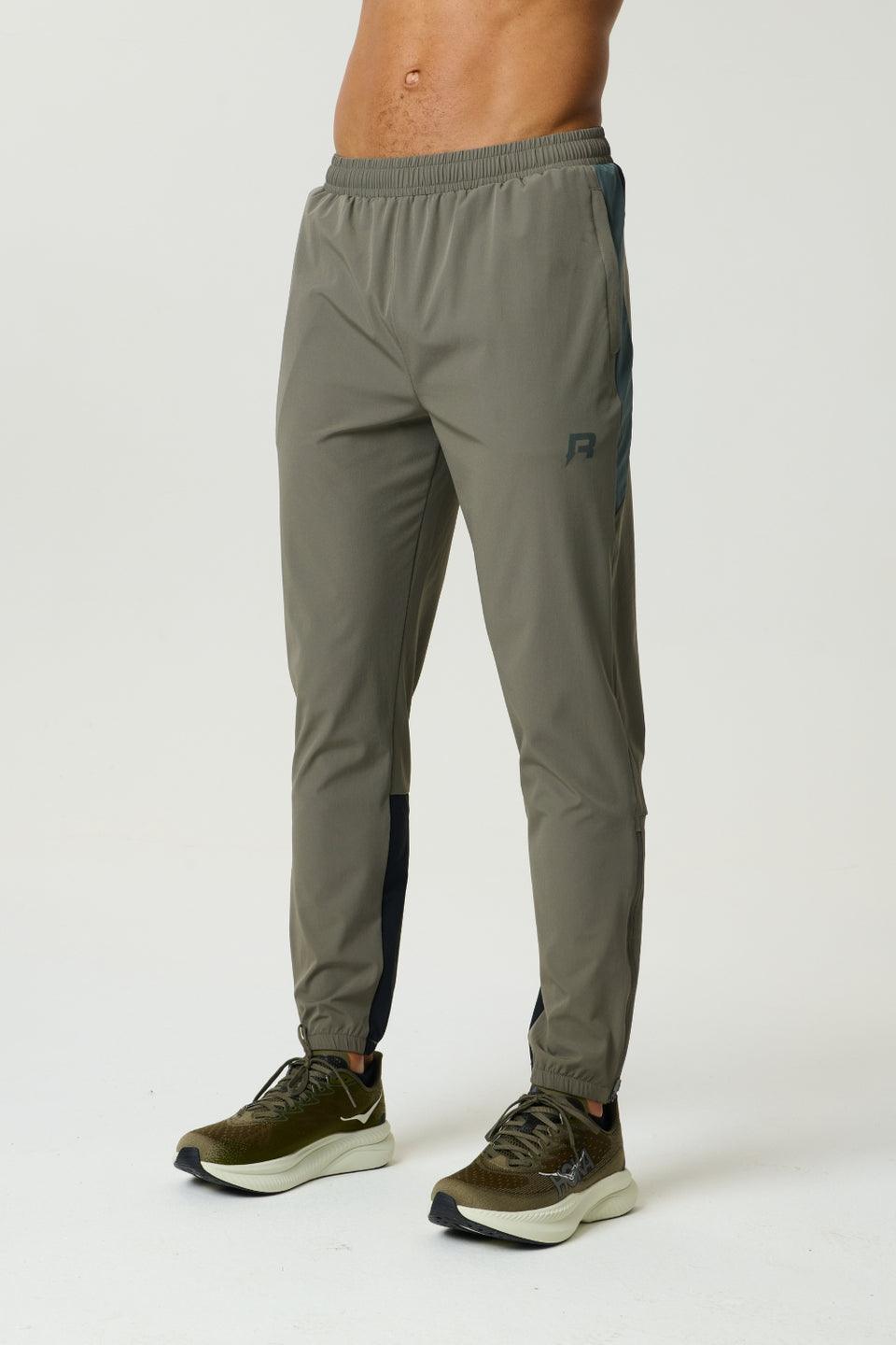 Reprimo Vortex Pants in dark moss and grey velvet with ergonomic panels and adjustable waistband for flexible performance