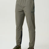 Reprimo Vortex Pants in dark moss and grey velvet with ergonomic panels and adjustable waistband for flexible performance