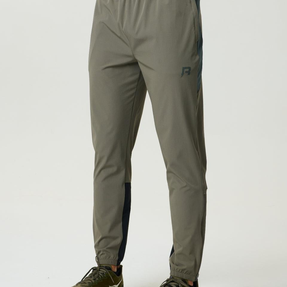 Reprimo Vortex Pants in dark moss and grey velvet with ergonomic panels and adjustable waistband for flexible performance