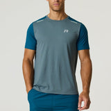 Athletic fit Reprimo Flight T-Shirt in tidal teal and blue steel with reflective strips for visibility and lightweight breathable fabric.