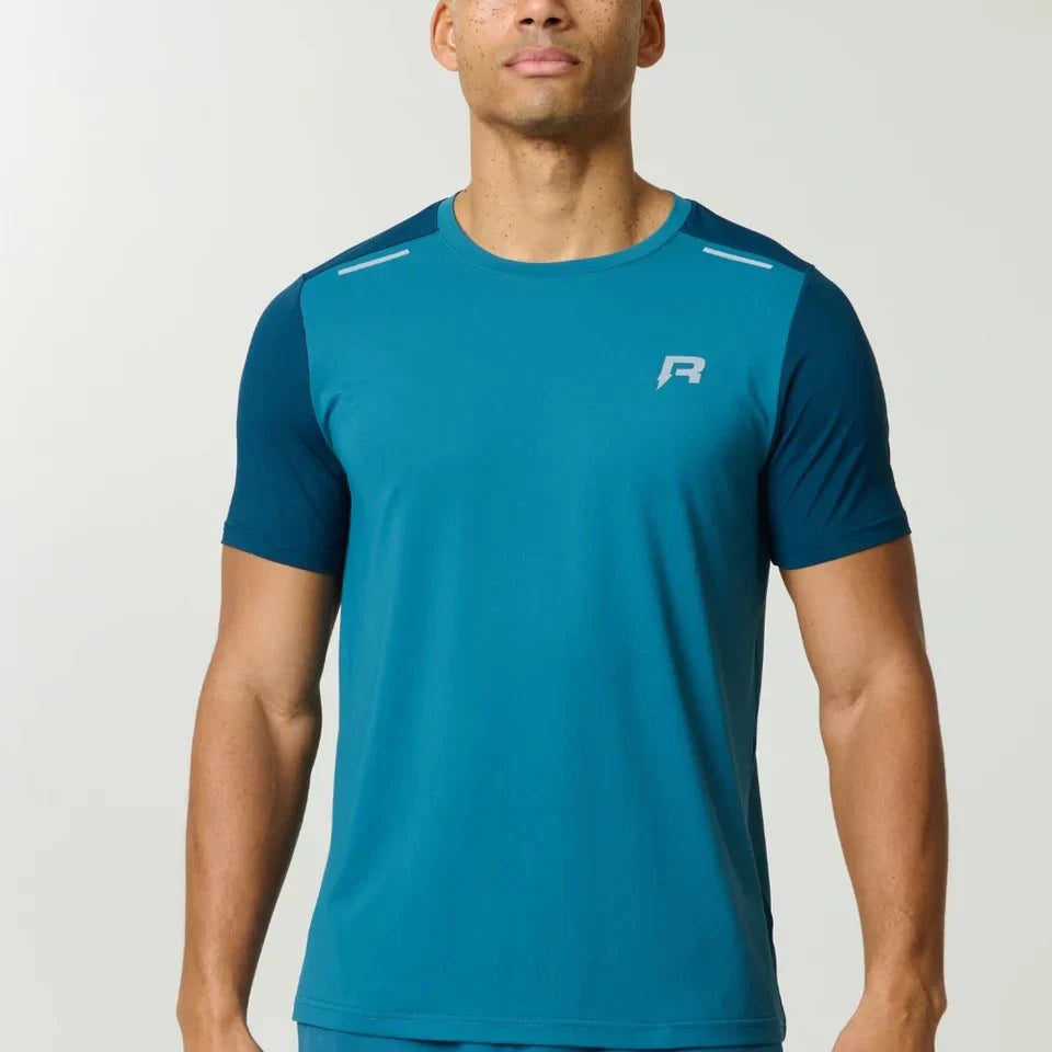 Reprimo Flight T-Shirt in lake blue and teal with breathable fabric and reflective strips for athletic performance