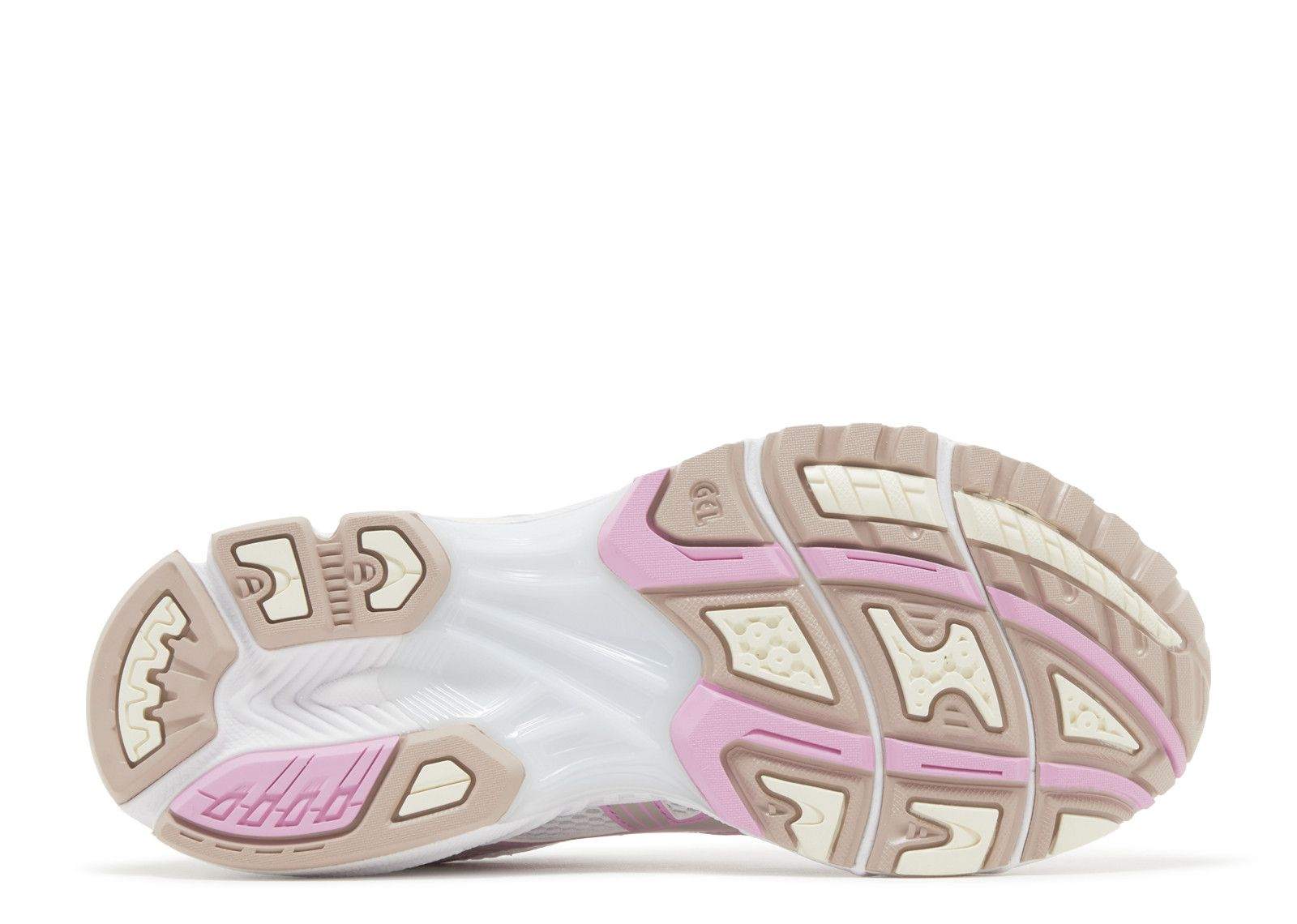 Gel Kayano 14 running shoe sole in white, fawn, and pink colors