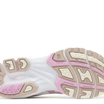 Gel Kayano 14 running shoe sole in white, fawn, and pink colors