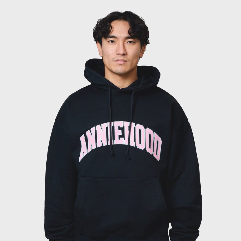 Navy ANNIE HOOD COLLEGE arch hoody in 500gsm brushback cotton with relaxed fit worn by model 6'0" 31 waist size M