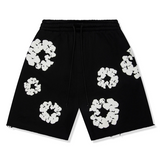 Denim Tears Cotton Wreath Sweatshorts in black and white.