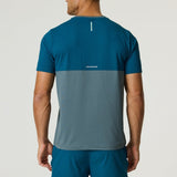 Back view of Reprimo Flight T-Shirt in tidal teal and blue steel, lightweight athletic fit with reflective strip for visibility.