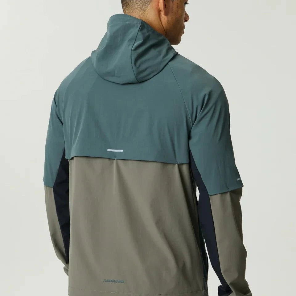 Reprimo Vortex Windbreaker in dark moss and grey velvet with ergonomic panels and reflective details