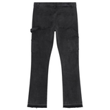 Back view of Siarr Carpenter Jeans in washed black with slim/flared fit, carpenter patchwork, and multiple pockets.