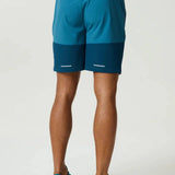Lake blue Reprimo Flight Shorts with breathable fabric, elastic waistband, and secure zippered pockets for athletic performance and comfort
