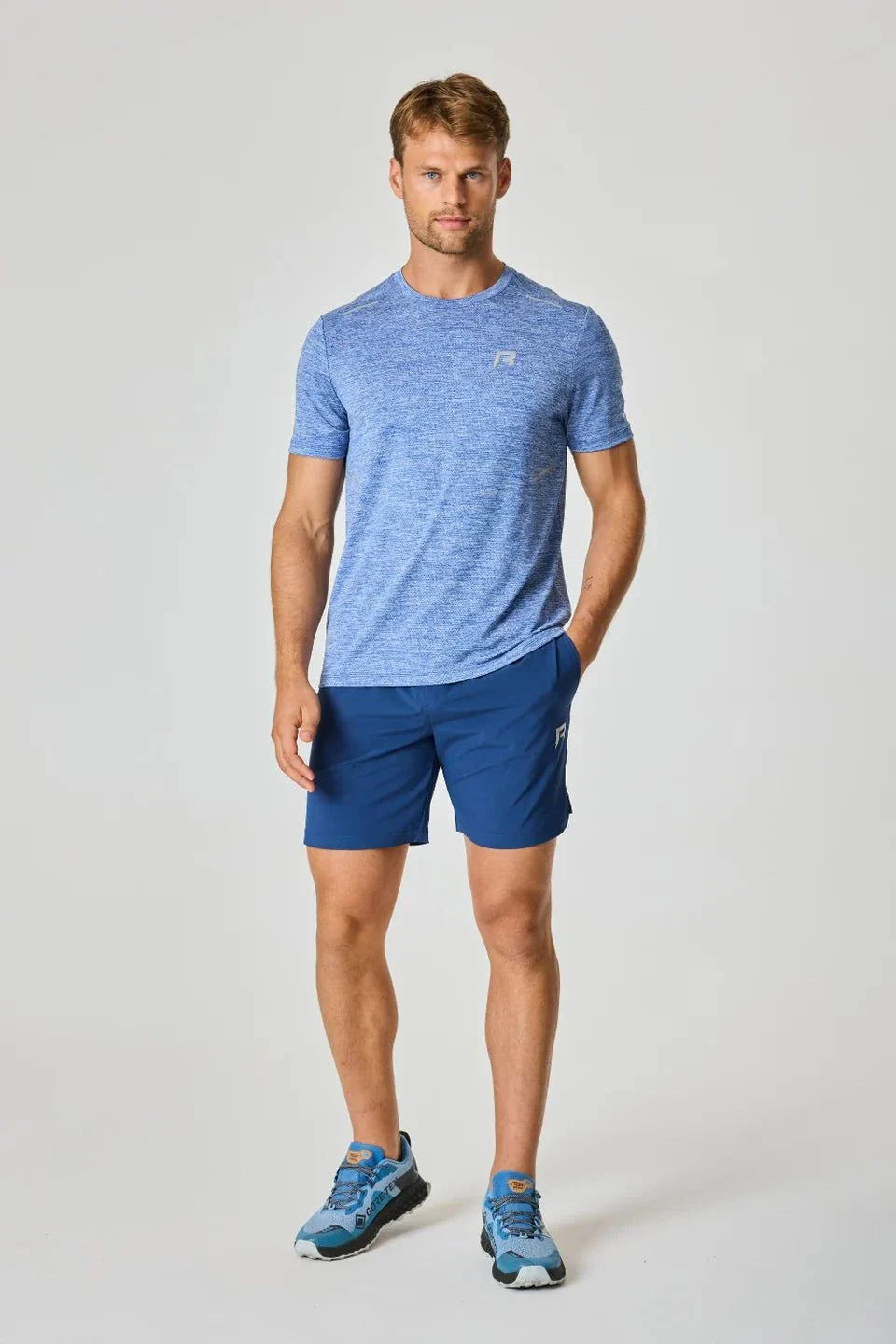 Reprimo Pulse T-Shirt in Indigo worn by model.