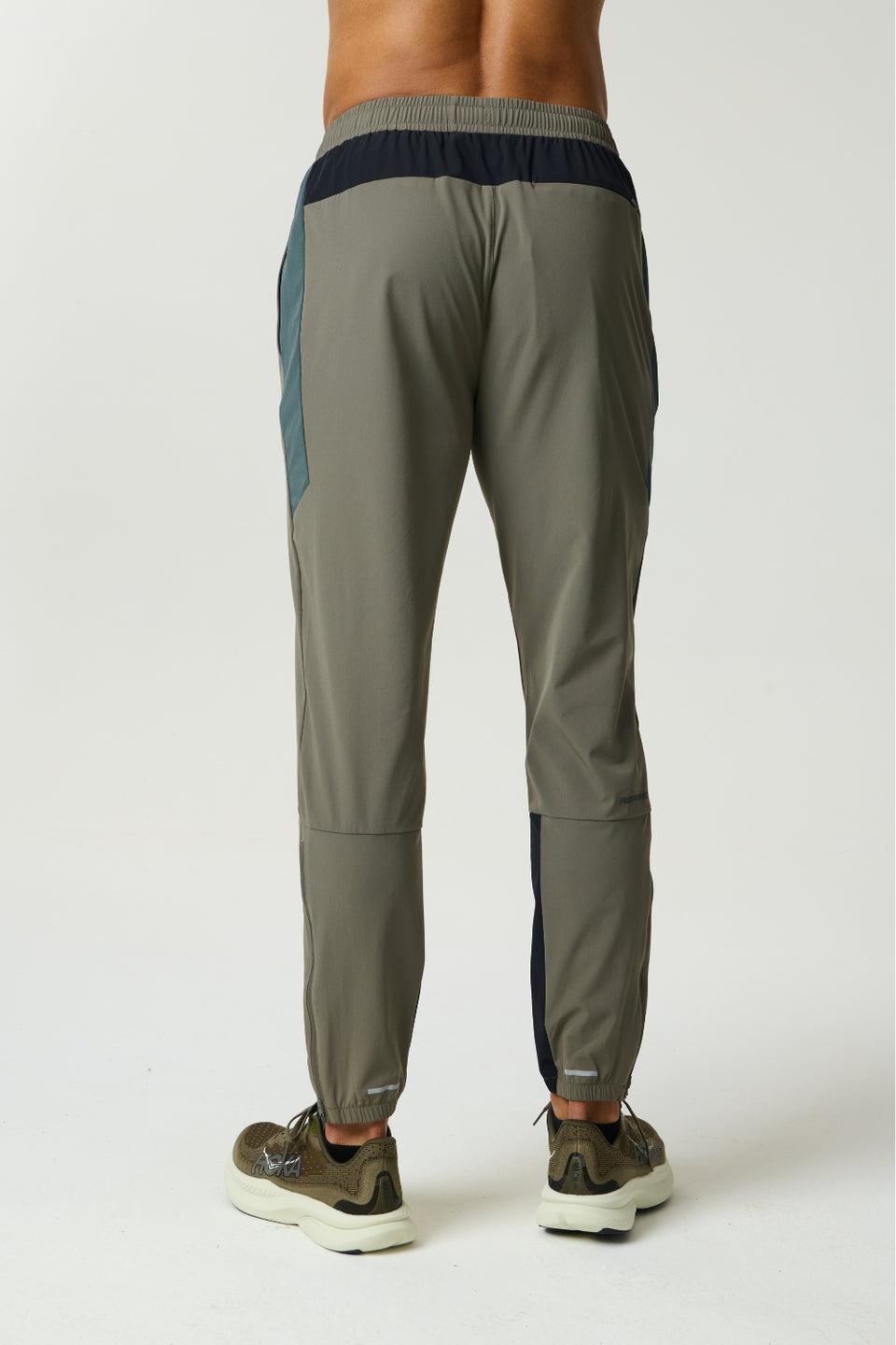 Reprimo Vortex Pants in dark moss and grey velvet with ergonomic panels and adjustable waistband for performance and comfort