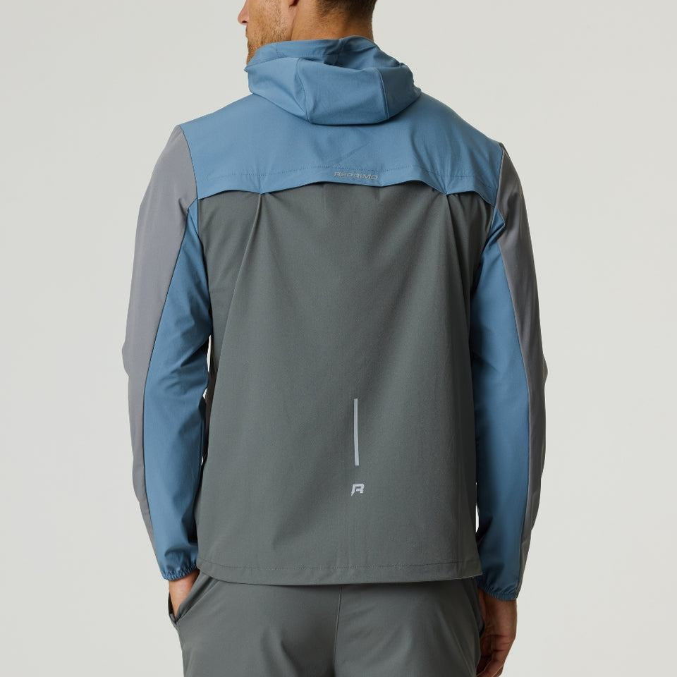 Reprimo Flight Windbreaker in Air Force Blue and Gunmetal, lightweight polyamide jacket with hood and back vent for breathability.