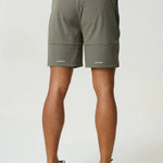 Reprimo Vortex Shorts in dark moss and grey velvet with ergonomic panels and adjustable waistband for flexible, technical performance
