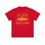 Corteiz Spain Alcatraz Tee in red displayed on a hanger