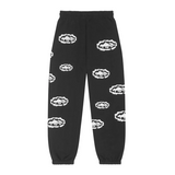 Denim Tears x Corteiz black sweatpants with white cotton wreath print