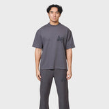 Annie Hood College T-shirt in washed black with relaxed fit, made from 280gsm cotton, worn by a 6'0 model in size M