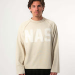 Natural Art Studio Sand Applique L/S cotton tee with distressed front logo and screen print back, boxy fit.