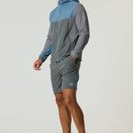Reprimo Flight Windbreaker in Air Force Blue and Gunmetal, lightweight polyamide jacket with hood, zip pockets, and breathable back vent for weather protection.