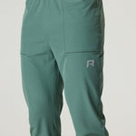 Men's Reprimo Glide Pants in botanical pine with tapered fit and secure seam-embedded pockets