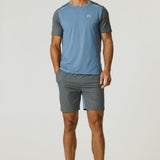 Reprimo Flight T-Shirt in Air Force Blue and Gunmetal with lightweight, breathable fabric and reflective strips for athletic performance and safety.