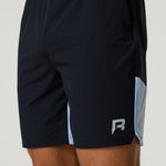 Black Reprimo Flight Shorts with dusky sky side panels, breathable lightweight fabric, elastic waistband, and functional zippered pockets.