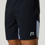 Black Reprimo Flight Shorts with dusky sky side panels, breathable lightweight fabric, elastic waistband, and functional zippered pockets.